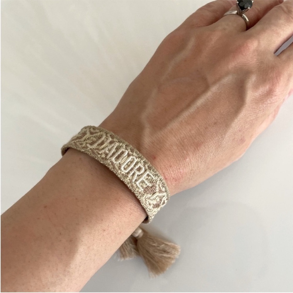 J’ADORE Elegant Beige Woven Bracelet cotton tassels logo nude soft